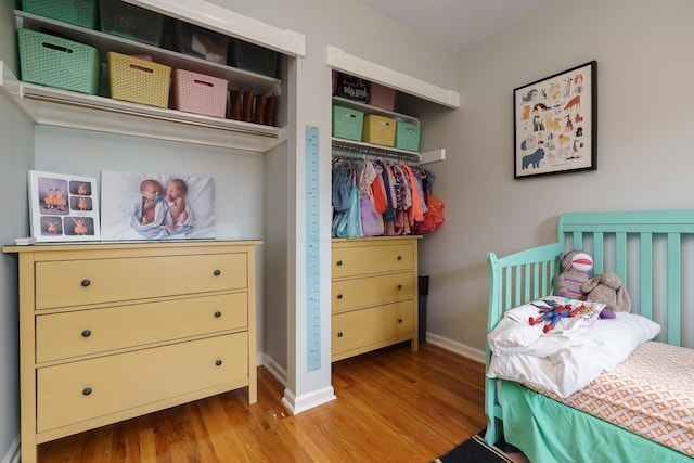 1108 Langland Dr, Columbus, OH 43220 - bedroom featuring wood finished floors and baseboards