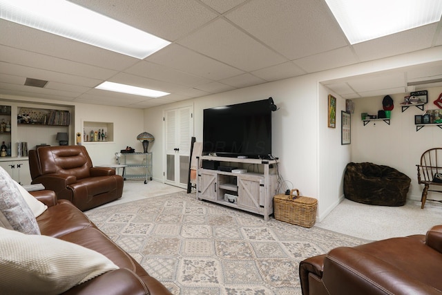 1108 Langland Dr, Columbus, OH 43220 - carpeted living room featuring a paneled ceiling and baseboards