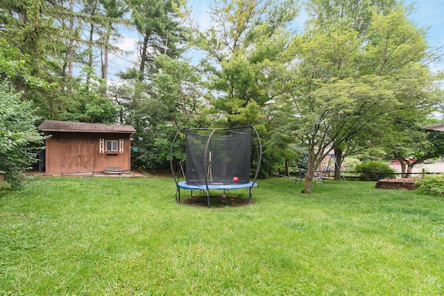 1108 Langland Dr, Columbus, OH 43220 - view of green lawn featuring a trampoline
