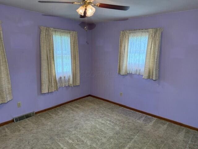 2377 E Howard Rd, Obetz, OH 43207 - empty room with ceiling fan and carpet floors