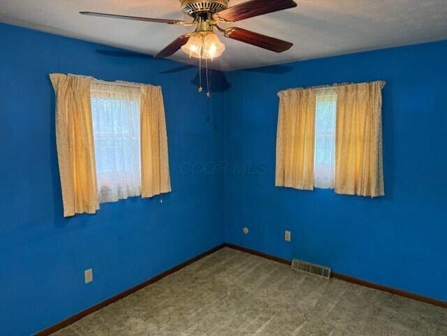 2377 E Howard Rd, Obetz, OH 43207 - carpeted empty room with a ceiling fan and baseboards