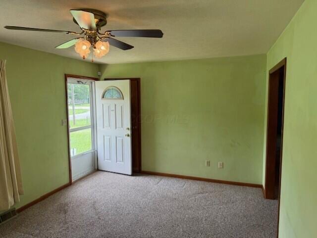 2377 E Howard Rd, Obetz, OH 43207 - empty room featuring carpet and ceiling fan