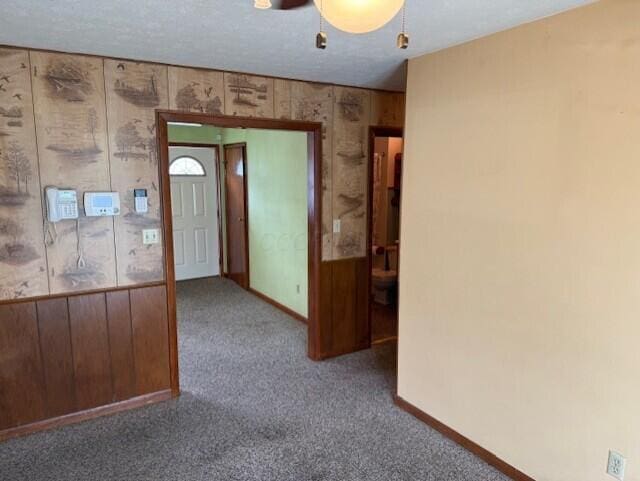 2377 E Howard Rd, Obetz, OH 43207 - empty room featuring carpet and wooden walls