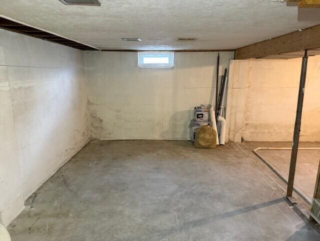 2377 E Howard Rd, Obetz, OH 43207 - basement featuring a textured ceiling