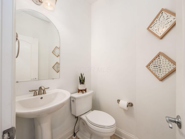 6165 Avocet Ct, Dublin, OH 43017 - bathroom with toilet and baseboards