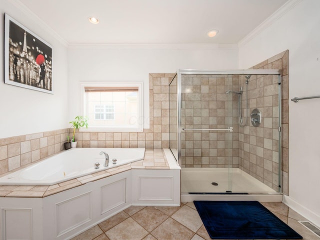6165 Avocet Ct, Dublin, OH 43017 - full bathroom featuring a bath, a shower stall, tile patterned flooring, crown molding, and recessed lighting