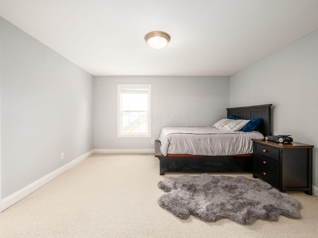 6165 Avocet Ct, Dublin, OH 43017 - bedroom featuring baseboards and carpet flooring