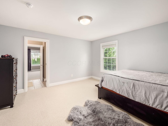 6165 Avocet Ct, Dublin, OH 43017 - bedroom with light carpet and multiple windows