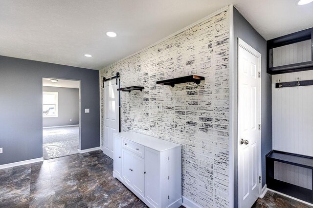 805 E Burgess St, Mount Vernon, OH 43050 - hallway with an accent wall, a barn door, and recessed lighting