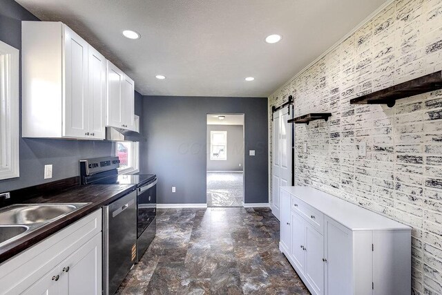 805 E Burgess St, Mount Vernon, OH 43050 - kitchen featuring appliances with stainless steel finishes, white cabinets, recessed lighting, dark countertops, and under cabinet range hood