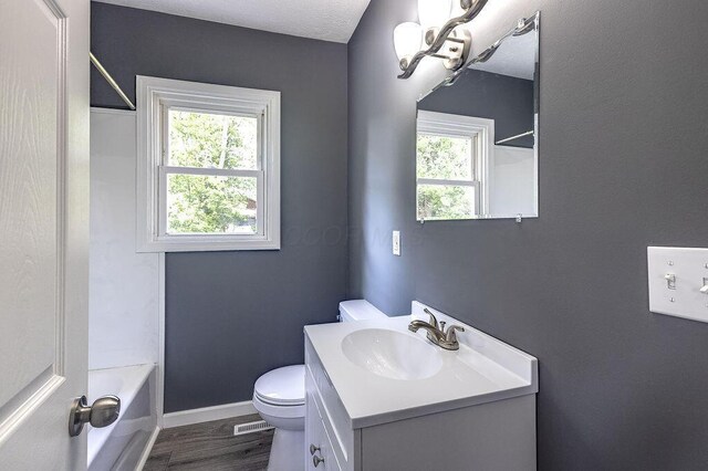 805 E Burgess St, Mount Vernon, OH 43050 - bathroom with vanity, plenty of natural light, and wood finished floors