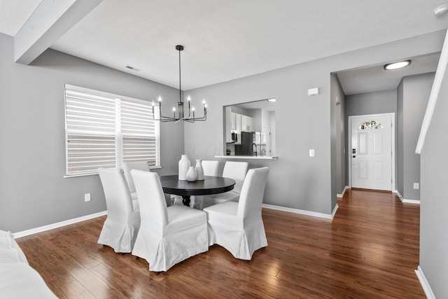 6166 Albany Crest Ave, New Albany, OH 43054 - dining area with a chandelier and dark wood-style flooring