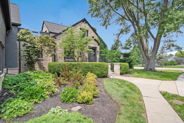 2946 Lewis Center Rd, Lewis Center, OH 43035 - tudor-style house featuring stone siding