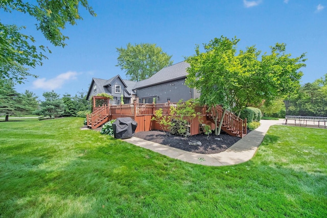 2946 Lewis Center Rd, Lewis Center, OH 43035 - view of grassy yard with stairway and a deck