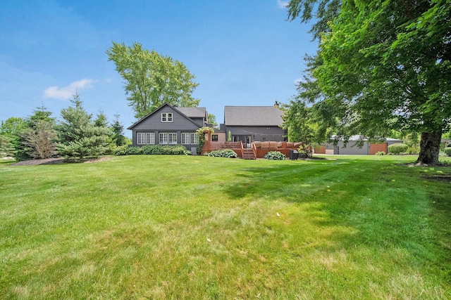 2946 Lewis Center Rd, Lewis Center, OH 43035 - view of grassy yard featuring a deck