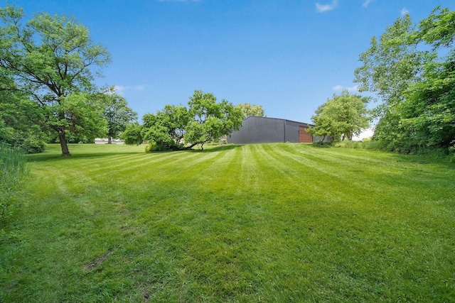 2946 Lewis Center Rd, Lewis Center, OH 43035 - view of green lawn featuring a pole building and an outbuilding