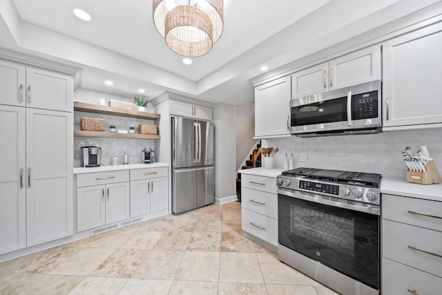 2946 Lewis Center Rd, Lewis Center, OH 43035 - kitchen featuring appliances with stainless steel finishes, backsplash, light countertops, recessed lighting, and open shelves