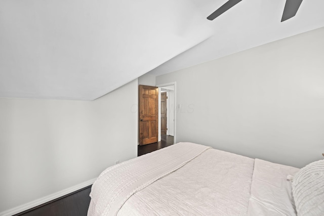 2946 Lewis Center Rd, Lewis Center, OH 43035 - bedroom featuring vaulted ceiling, wood finished floors, and a ceiling fan