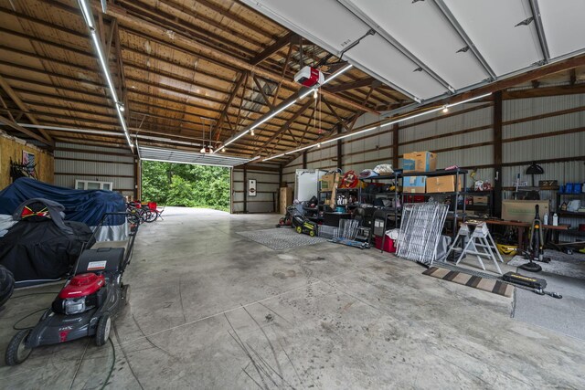 2946 Lewis Center Rd, Lewis Center, OH 43035 - garage featuring metal wall and a garage door opener