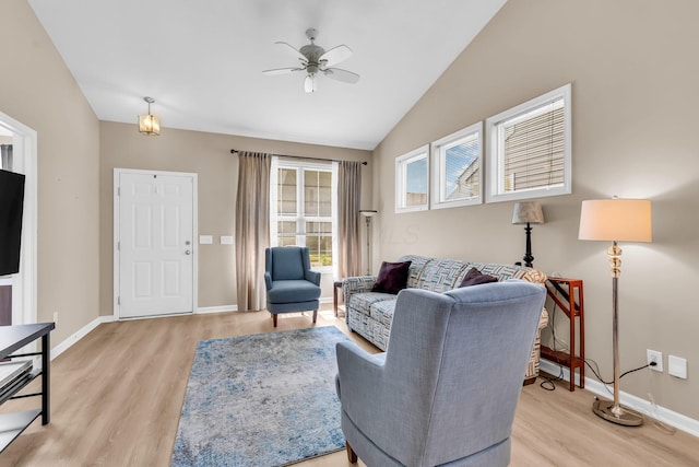 5442 Goose Falls Dr, Dublin, OH 43016 - living room with ceiling fan, light wood-style flooring, and lofted ceiling