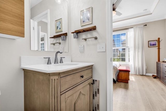 5442 Goose Falls Dr, Dublin, OH 43016 - ensuite bathroom with vanity, wood finished floors, ceiling fan, and crown molding