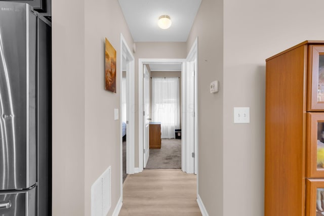 5442 Goose Falls Dr, Dublin, OH 43016 - hallway with light wood-style floors and baseboards