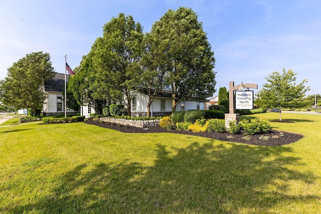 5442 Goose Falls Dr, Dublin, OH 43016 - view of front of house with a front yard and board and batten siding