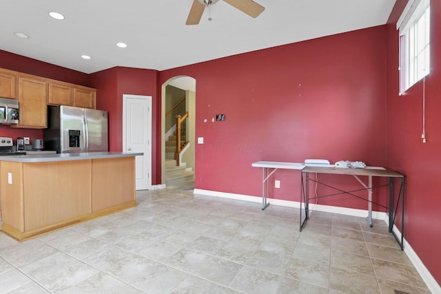 331 Hanton Way, Columbus, OH 43213 - kitchen with appliances with stainless steel finishes, baseboards, ceiling fan, light countertops, and recessed lighting