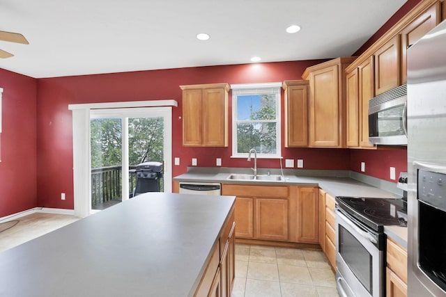 331 Hanton Way, Columbus, OH 43213 - kitchen featuring appliances with stainless steel finishes, a sink, healthy amount of natural light, recessed lighting, and light countertops