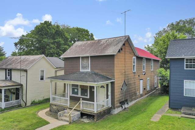408 E Mulberry St, Lancaster, OH 43130 - view of front of home with a porch, a front yard, and a shingled roof