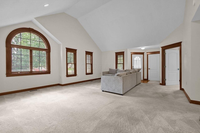 1366 Chapel Way, Heath, OH 43056 - unfurnished living room with light colored carpet, lofted ceiling, and healthy amount of natural light