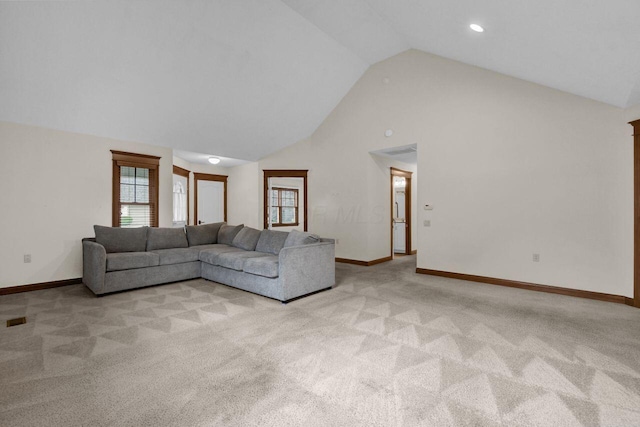 1366 Chapel Way, Heath, OH 43056 - living area with light colored carpet, high vaulted ceiling, and recessed lighting