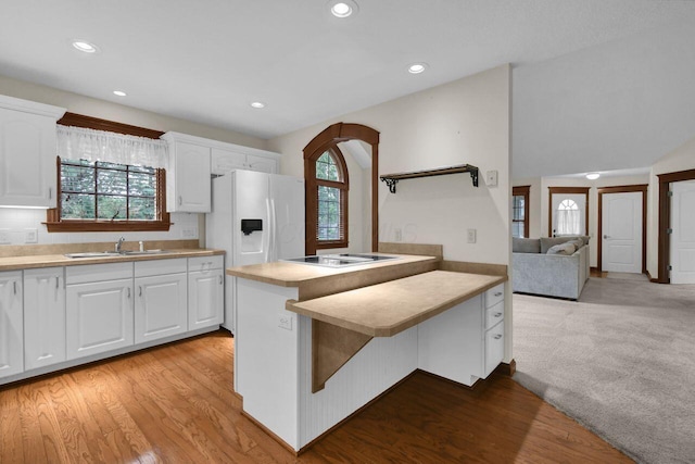 1366 Chapel Way, Heath, OH 43056 - kitchen featuring electric cooktop, white cabinetry, light wood finished floors, recessed lighting, and light countertops