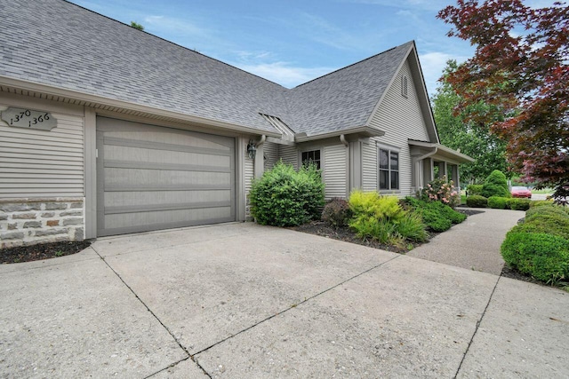 1366 Chapel Way, Heath, OH 43056 - view of front of property with a shingled roof, driveway, and an attached garage