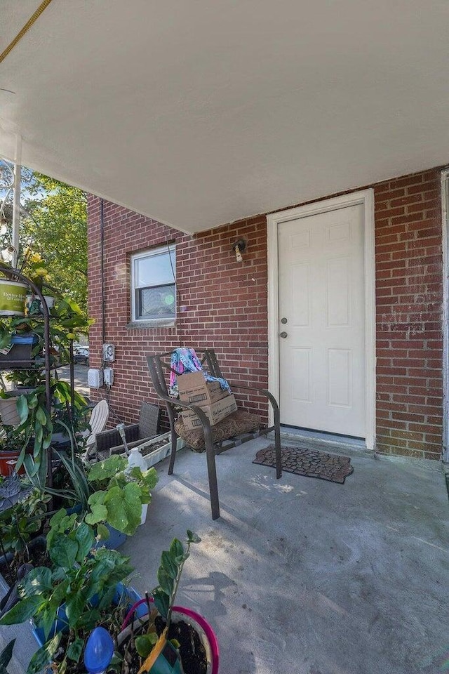 3276-3278 Sullivant Ave, Columbus, OH 43204 - property entrance featuring brick siding
