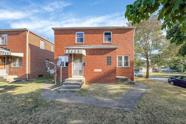 3276-3278 Sullivant Ave, Columbus, OH 43204 - view of property with a front lawn and brick siding