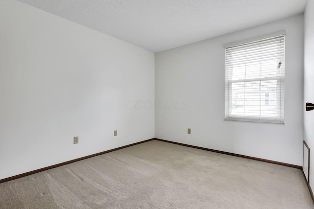 5062 Stoneybrook Blvd Unit 3F, Hilliard, OH 43026 - empty room featuring carpet flooring