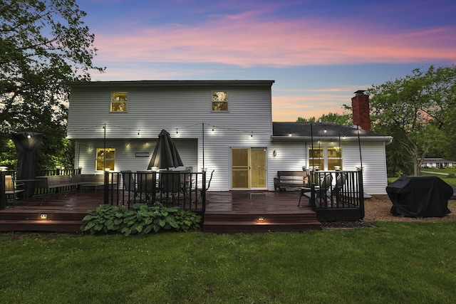 13680 Nantucket Ave NW, Pickerington, OH 43147 - rear view of property featuring a chimney, a lawn, and a wooden deck