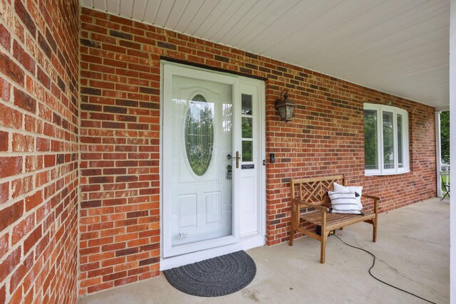 13680 Nantucket Ave NW, Pickerington, OH 43147 - doorway to property featuring brick siding and a porch