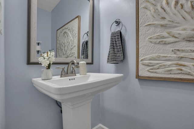 13680 Nantucket Ave NW, Pickerington, OH 43147 - bathroom featuring a sink and baseboards