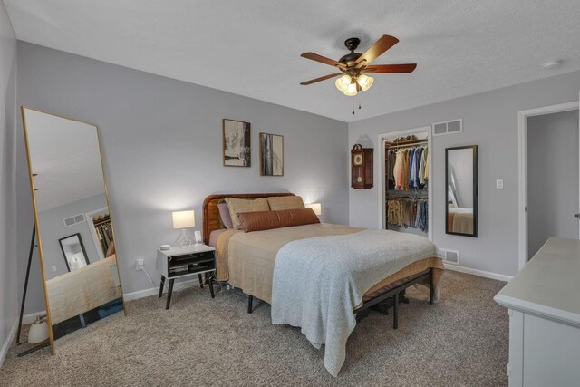 13680 Nantucket Ave NW, Pickerington, OH 43147 - bedroom with light carpet, a spacious closet, a closet, and ceiling fan