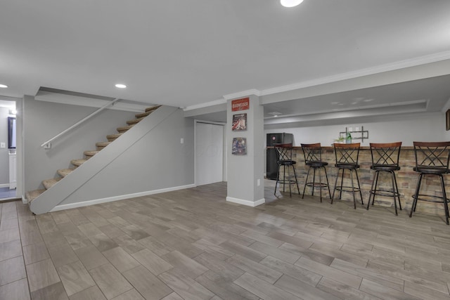 13680 Nantucket Ave NW, Pickerington, OH 43147 - living room with a bar, stairway, recessed lighting, wood finished floors, and baseboards