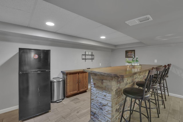 13680 Nantucket Ave NW, Pickerington, OH 43147 - indoor dry bar featuring freestanding refrigerator, wood finish floors, and recessed lighting