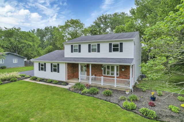 13680 Nantucket Ave NW, Pickerington, OH 43147 - traditional-style house featuring a porch, a front yard, brick siding, and roof with shingles