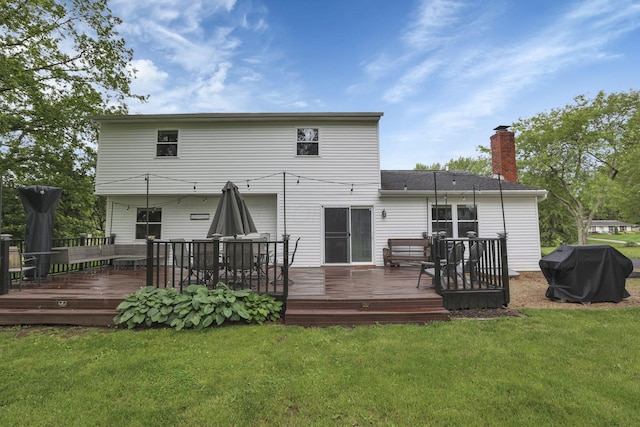 13680 Nantucket Ave NW, Pickerington, OH 43147 - rear view of house featuring a chimney, a yard, and a deck