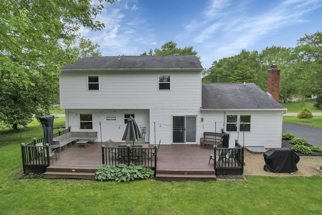13680 Nantucket Ave NW, Pickerington, OH 43147 - back of property with a lawn, a chimney, and outdoor dining area