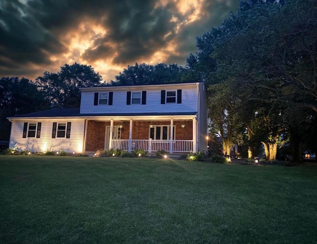 13680 Nantucket Ave NW, Pickerington, OH 43147 - view of front of house with covered porch and a front yard