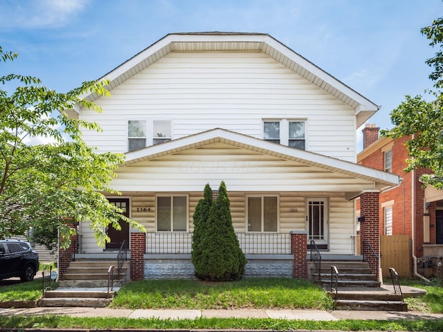 1364-1366 S 3rd St, Columbus, OH 43207 - view of front facade featuring a porch