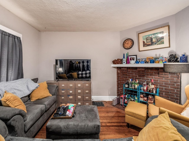 1364-1366 S 3rd St, Columbus, OH 43207 - living area featuring wood finished floors and a textured ceiling