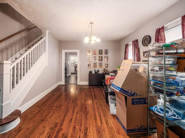 1364-1366 S 3rd St, Columbus, OH 43207 - dining area featuring stairway, a chandelier, wood finished floors, and baseboards